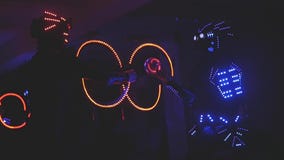 Costume show at the party, glowing in the dark stock footage Costume show at the party, glowing in the dark stock footage