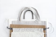 Shopping bags on white background.Cotton and paper bags for free plastic shopping. stock photos Shopping bags on white background.Cotton and paper bags for free plastic shopping. stock photos