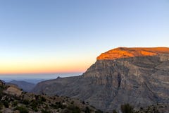 Coucher du soleil au-dessus des feintes de Jebel - Oman photos libres de droits Coucher du soleil au-dessus des feintes de Jebel - Oman photos libres de droits
