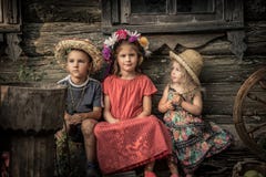 Countryside rustic lifestyle children sitting together old countryside house symbolizing kids friendship and happy carefree rusti stock photography Countryside rustic lifestyle children sitting together old countryside house symbolizing kids friendship and happy carefree rusti stock photography