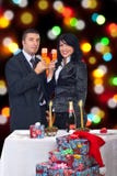 Couple Celebrate Christmas Night Stock Image