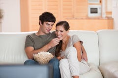 https://thumbs.dreamstime.com/t/couple-couch-watching-movie-together-22361786.jpg