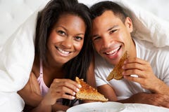 https://thumbs.dreamstime.com/t/couple-enjoying-breakfast-bed-smiling-to-camera-31163491.jpg