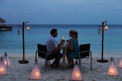 Couple Enjoying Late Meal In Outdoor Restaurant stock image Couple Enjoying Late Meal In Outdoor Restaurant stock image