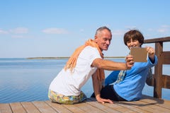 Couple Enjoying Life, Taking Selfie On Sea Stock Image Couple Enjoying Life, Taking Selfie On Sea Stock Image