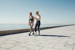 Couple female running exercising jogging happy on waterfront royalty free stock images Couple female running exercising jogging happy on waterfront royalty free stock images