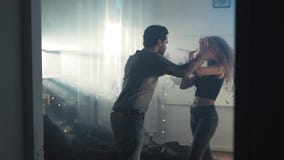 Couple having a quarrel. Woman is crying while man is scolding in the background, love and tears, student young love stock video footage Couple having a quarrel. Woman is crying while man is scolding in the background, love and tears, student young love stock video footage