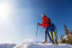 Couple hiking outside in winter nature stock photo Couple hiking outside in winter nature stock photo