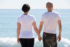Couple holding each other on the beach royalty free stock photos Couple holding each other on the beach royalty free stock photos