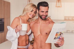 Couple in kitchen stock image Couple in kitchen stock image