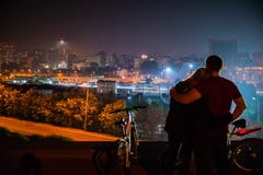 Couple in love with the panorama of the night city royalty free stock photo Couple in love with the panorama of the night city royalty free stock photo