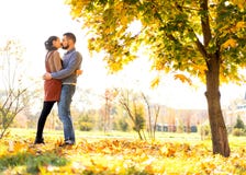 Couple in love walking in autumn park royalty free stock photo Couple in love walking in autumn park royalty free stock photo