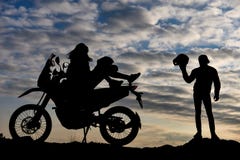 Couple with motorcycle at sunset stock photos Couple with motorcycle at sunset stock photos