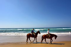 Couple Of Horse Riders On Beach Stock Photo Couple Of Horse Riders On Beach Stock Photo