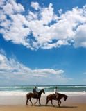 Couple Of Horse Riders On Beach Royalty Free Stock Images Couple Of Horse Riders On Beach Royalty Free Stock Images