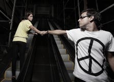Couple On An Escalator Stock Images Couple On An Escalator Stock Images