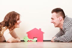 Couple with paper house. Housing real estate. stock photo Couple with paper house. Housing real estate. stock photo