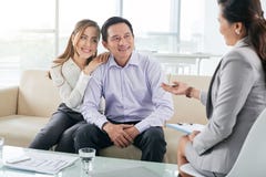 Couple and realtor Royalty Free Stock Images Couple and realtor Royalty Free Stock Images