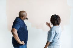 A couple renovating the house stock images A couple renovating the house stock images
