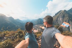 Couple selfie on mountain top at Nong Khiaw panoramic view over Nam Ou River valley Laos travel destination in South East Asia, royalty free stock photography Couple selfie on mountain top at Nong Khiaw panoramic view over Nam Ou River valley Laos travel destination in South East Asia, royalty free stock photography