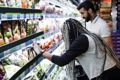 A couple shopping for food royalty free stock images A couple shopping for food royalty free stock images