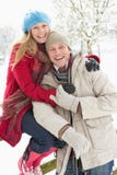 Couple Standing Outside In Snowy Landscape stock images Couple Standing Outside In Snowy Landscape stock images