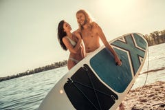 Couple standup paddle boarding Royalty Free Stock Image Couple standup paddle boarding Royalty Free Stock Image