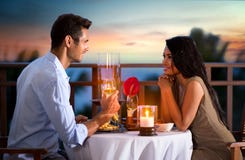 Couple on summer evening having romantic dinner Stock Image Couple on summer evening having romantic dinner Stock Image