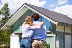 Couple and their house stock image Couple and their house stock image