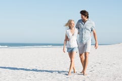Couple walking at beach royalty free stock photo Couple walking at beach royalty free stock photo