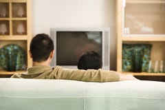 Couple Watching TV. Royalty Free Stock Photography Couple Watching TV. Royalty Free Stock Photography