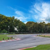 Courbe de voie de course photographie stock Courbe de voie de course photographie stock