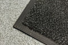 Couvre-tapis industriel de la poussière images libres de droits Couvre-tapis industriel de la poussière images libres de droits