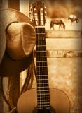 Cowboy Hat And Guitar.American Music Background Royalty Free Stock Image