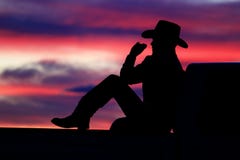 Cowboy-Sonnenuntergang lizenzfreie stockfotos Cowboy-Sonnenuntergang lizenzfreie stockfotos