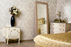 Cozy stylish vintage corner of the ivory bedroom Royalty Free Stock Photography Cozy stylish vintage corner of the ivory bedroom Royalty Free Stock Photography