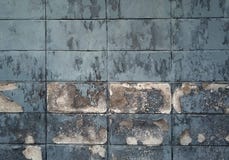 Cracked cement covered with gray cement surface as background for design