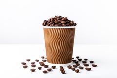 Craft coffee cup full of coffee bean on white background royalty free stock image Craft coffee cup full of coffee bean on white background royalty free stock image