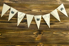 Craft paper flags party garland on wooden background royalty free stock image Craft paper flags party garland on wooden background royalty free stock image