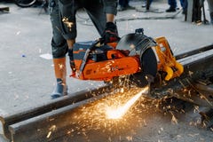 Craftsman Using Machines Cutting Steel Rail Royalty Free Stock Images Craftsman Using Machines Cutting Steel Rail Royalty Free Stock Images