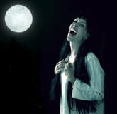 Crazy bloody scary vampire girl with fangs stock images Crazy bloody scary vampire girl with fangs stock images