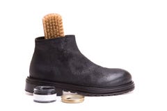 Cleaning and care of shoes on a white background. stock photography Cleaning and care of shoes on a white background. stock photography