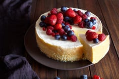 Creamy Mascarpone Cheese Cake With Strawberry And Winter Berries. Christmas New York Cheesecake. Healthy Food Ration . Stock Images Creamy Mascarpone Cheese Cake With Strawberry And Winter Berries. Christmas New York Cheesecake. Healthy Food Ration . Stock Images