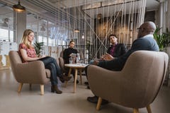Creative business people discussing new project royalty free stock photo Creative business people discussing new project royalty free stock photo