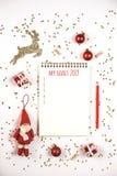 Creative Christmas composition with notepad and decorations. stock images Creative Christmas composition with notepad and decorations. stock images
