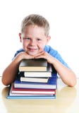Criança feliz com livros fotos de stock Criança feliz com livros fotos de stock