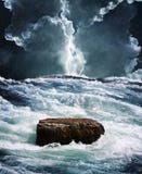Crisis rock in raging ocean royalty free stock images Crisis rock in raging ocean royalty free stock images