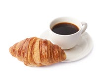 Croissant e tazza di caffè fotografie stock Croissant e tazza di caffè fotografie stock