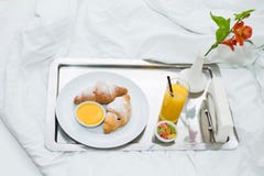 Croissants with honey and orange juice stock photos Croissants with honey and orange juice stock photos