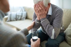 Nurse taking care of senior man stock photos Nurse taking care of senior man stock photos